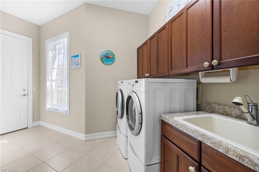 20196 Markward Crossing Estero, FL 33928 - Photo 25 of 42 a utility room with sink dryer and washer