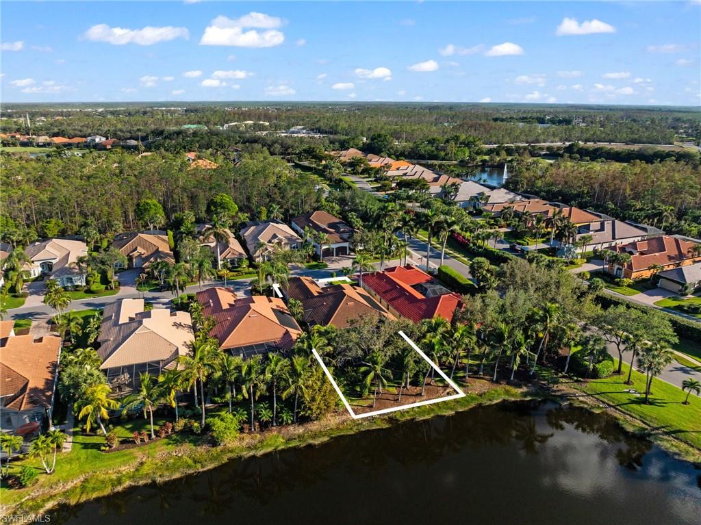 20196 Markward Crossing Estero, FL 33928 - Photo 35 of 42 an aerial view of residential houses with outdoor space and lake view