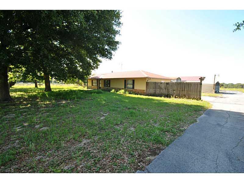 3816 Rix Road Lady Lake, FL 32159 - Photo 1 of 1 Exterior Front - View from the entry driveway.