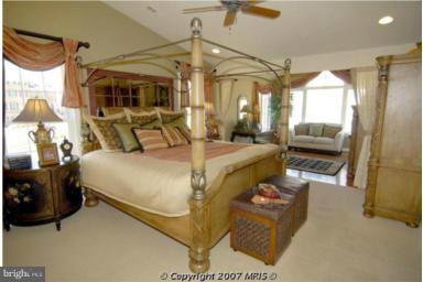 2614 Maple Rock Road Hanover, MD 21076 - Photo 4 of 11 a large bedroom with a large bed and a large window