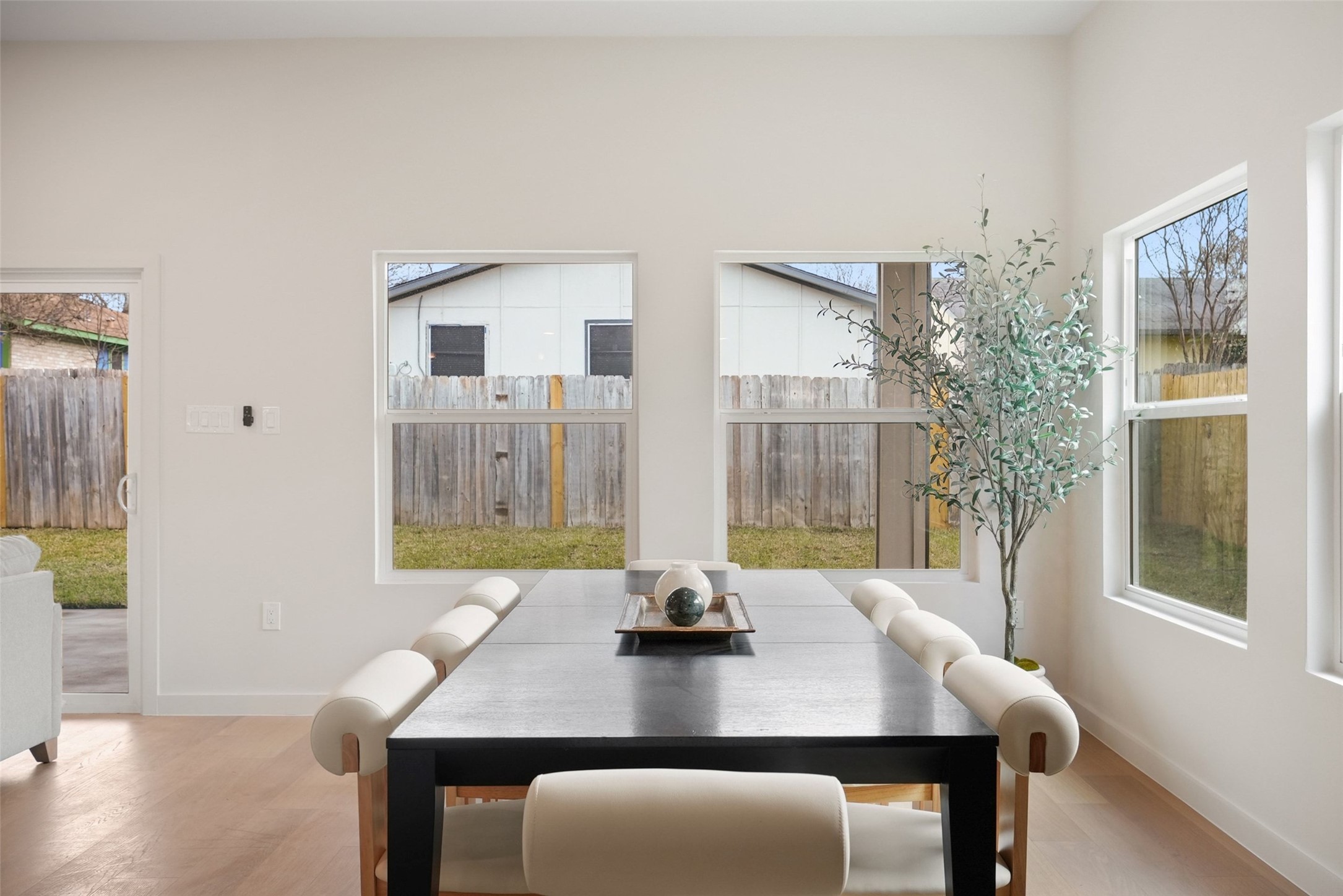 6307 Clubway Lane Austin, TX 78745 - Photo 12 of 34 a view of a dining room with furniture and window