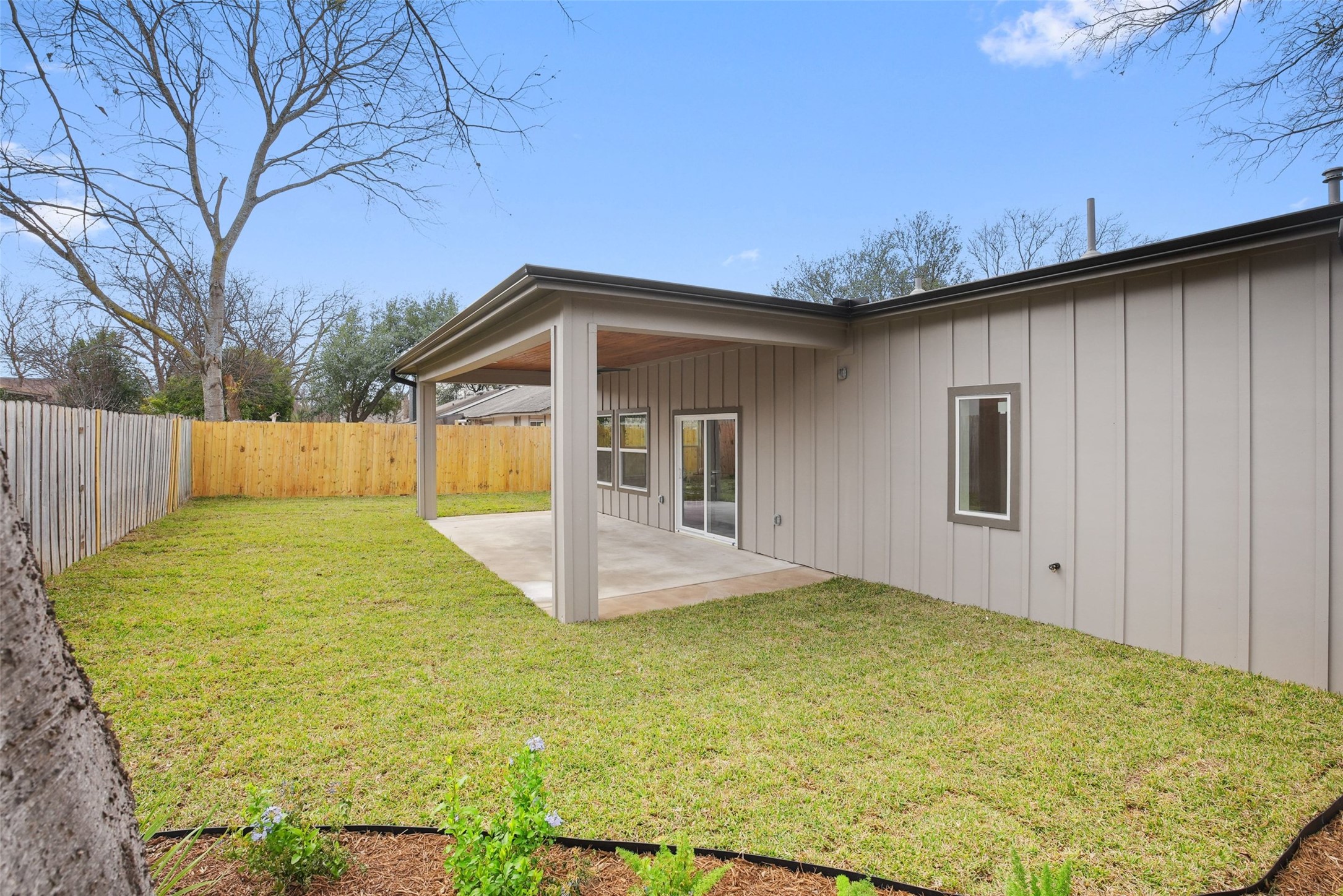 6307 Clubway Lane Austin, TX 78745 - Photo 32 of 34 a view of a backyard with cabin