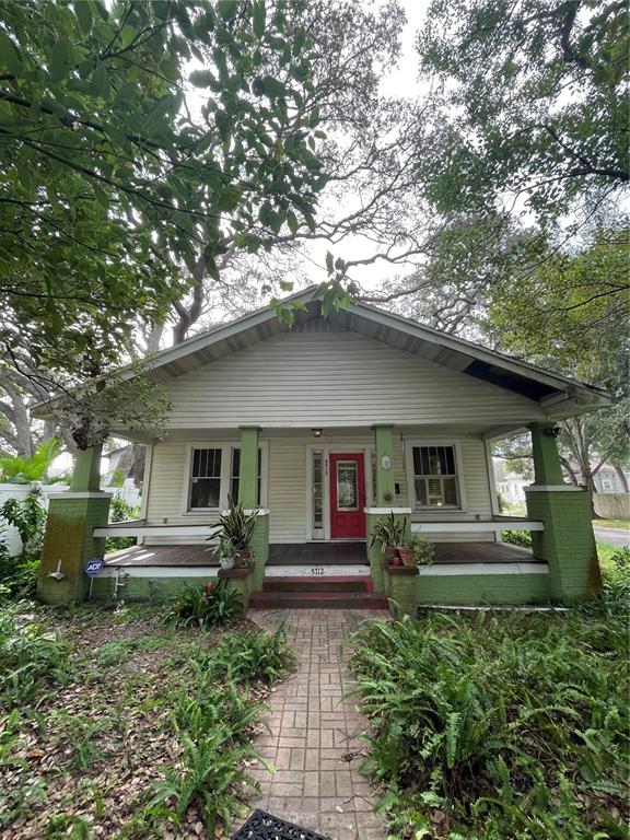 5712 North 9th Street Tampa, FL 33604 - Photo 1 of 17 a front view of house with yard