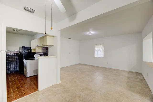 a view of kitchen and living room