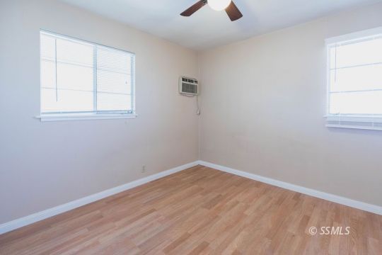 249 North Alvord Street Ridgecrest, CA 93555 - Photo 18 of 39 an empty room with a window