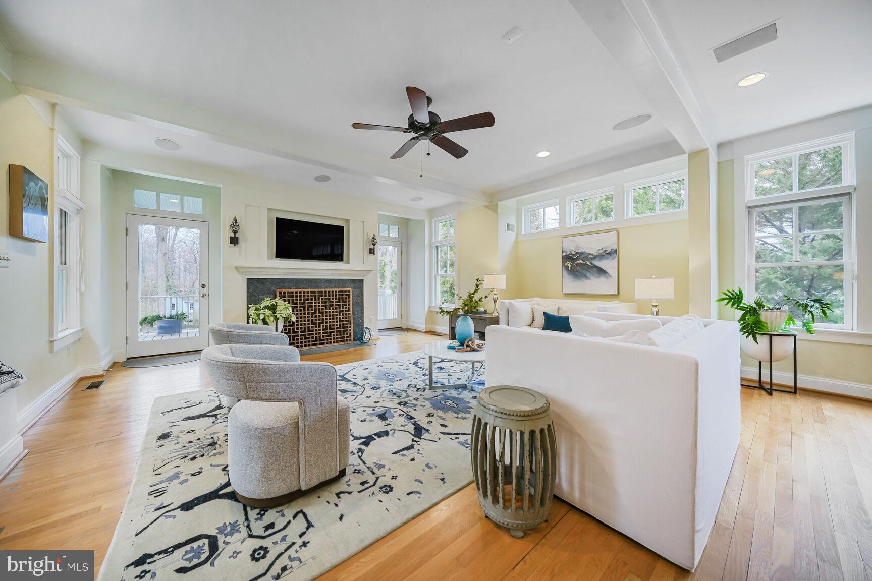 2012 Rockingham Street McLean, VA 22101 - Photo 11 of 45 a living room with fireplace furniture and a wooden floor