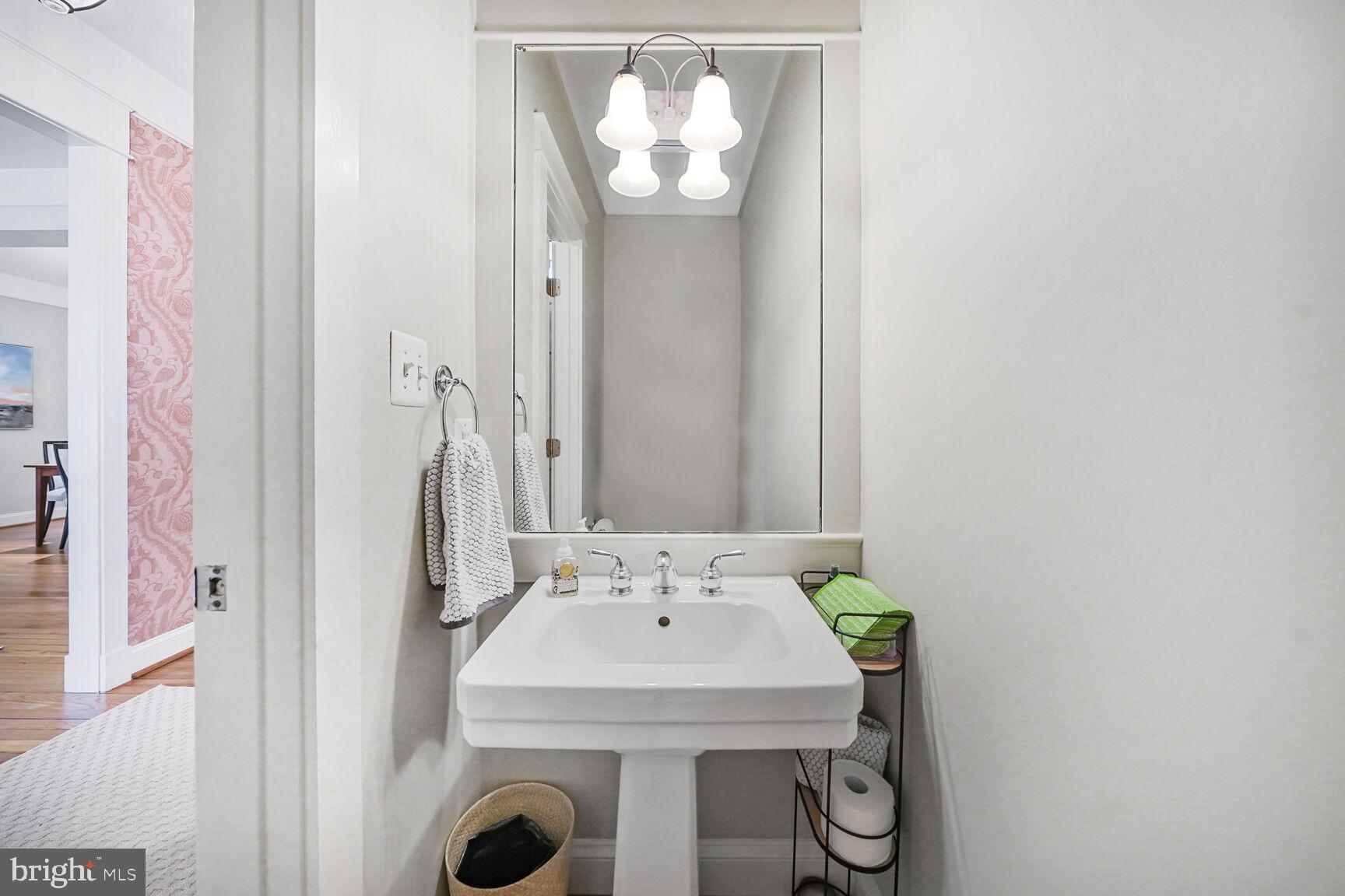 2012 Rockingham Street McLean, VA 22101 - Photo 19 of 45 a bathroom with a sink and a mirror