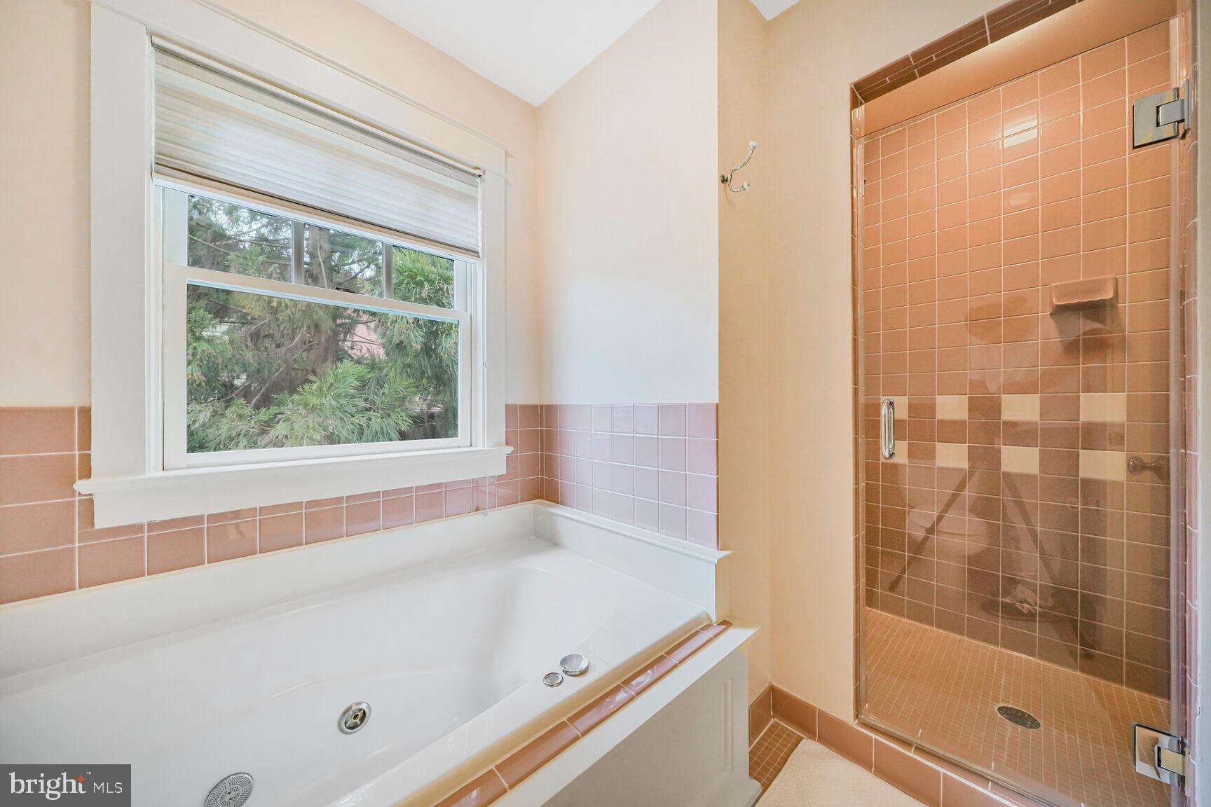 2012 Rockingham Street McLean, VA 22101 - Photo 23 of 45 a bathroom with a bathtub and shower