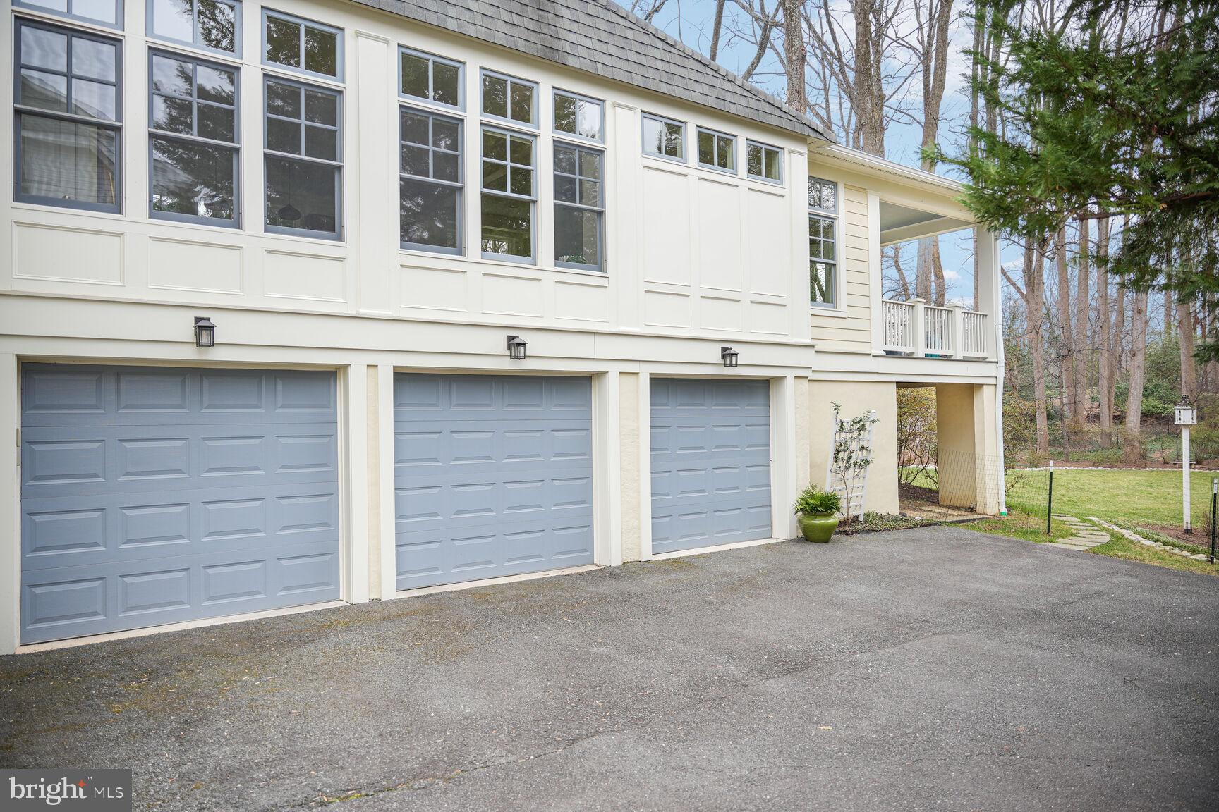 2012 Rockingham Street McLean, VA 22101 - Photo 39 of 45 a front view of a house with a yard and garage