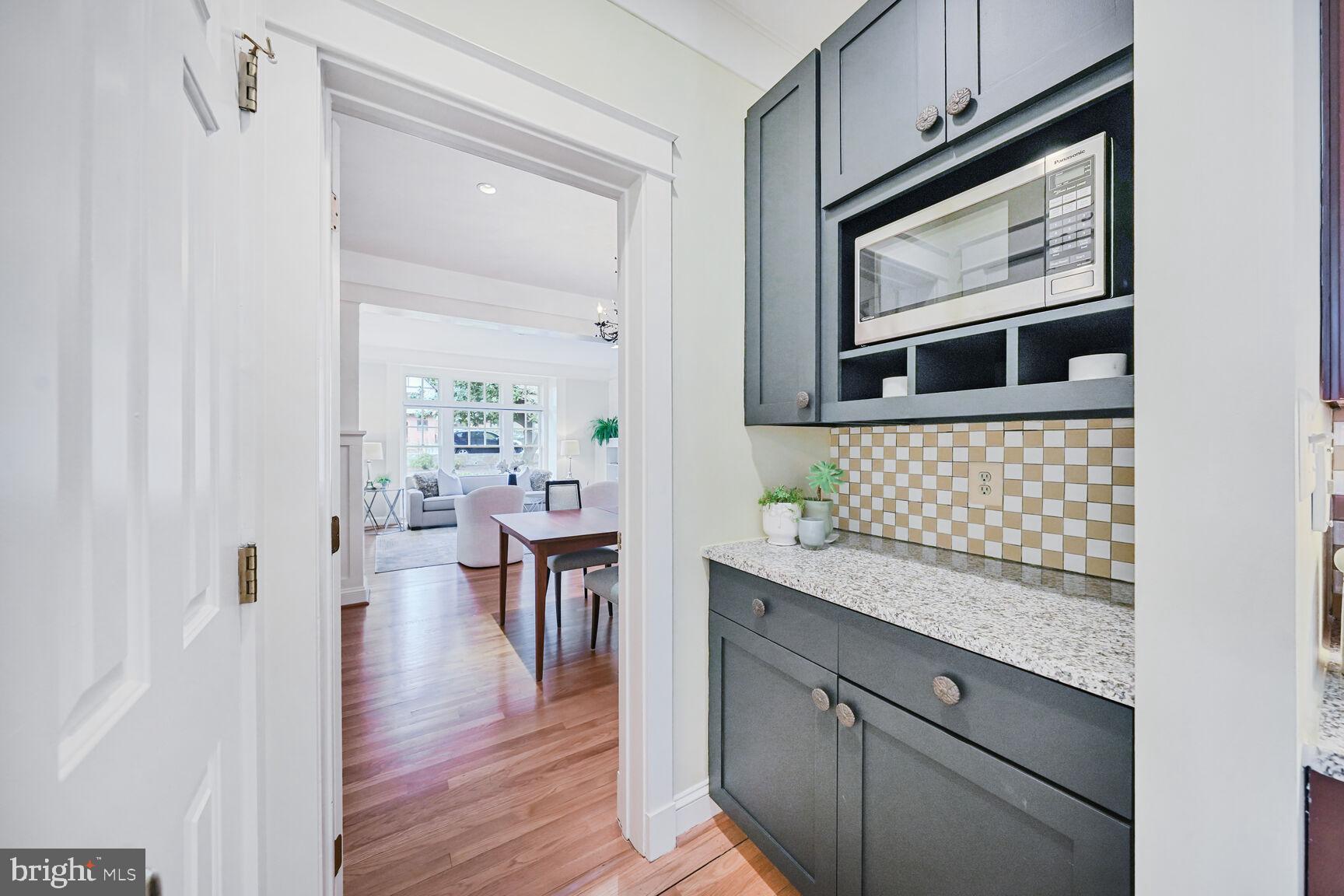 2012 Rockingham Street McLean, VA 22101 - Photo 7 of 45 a kitchen with granite countertop white cabinets and white appliances