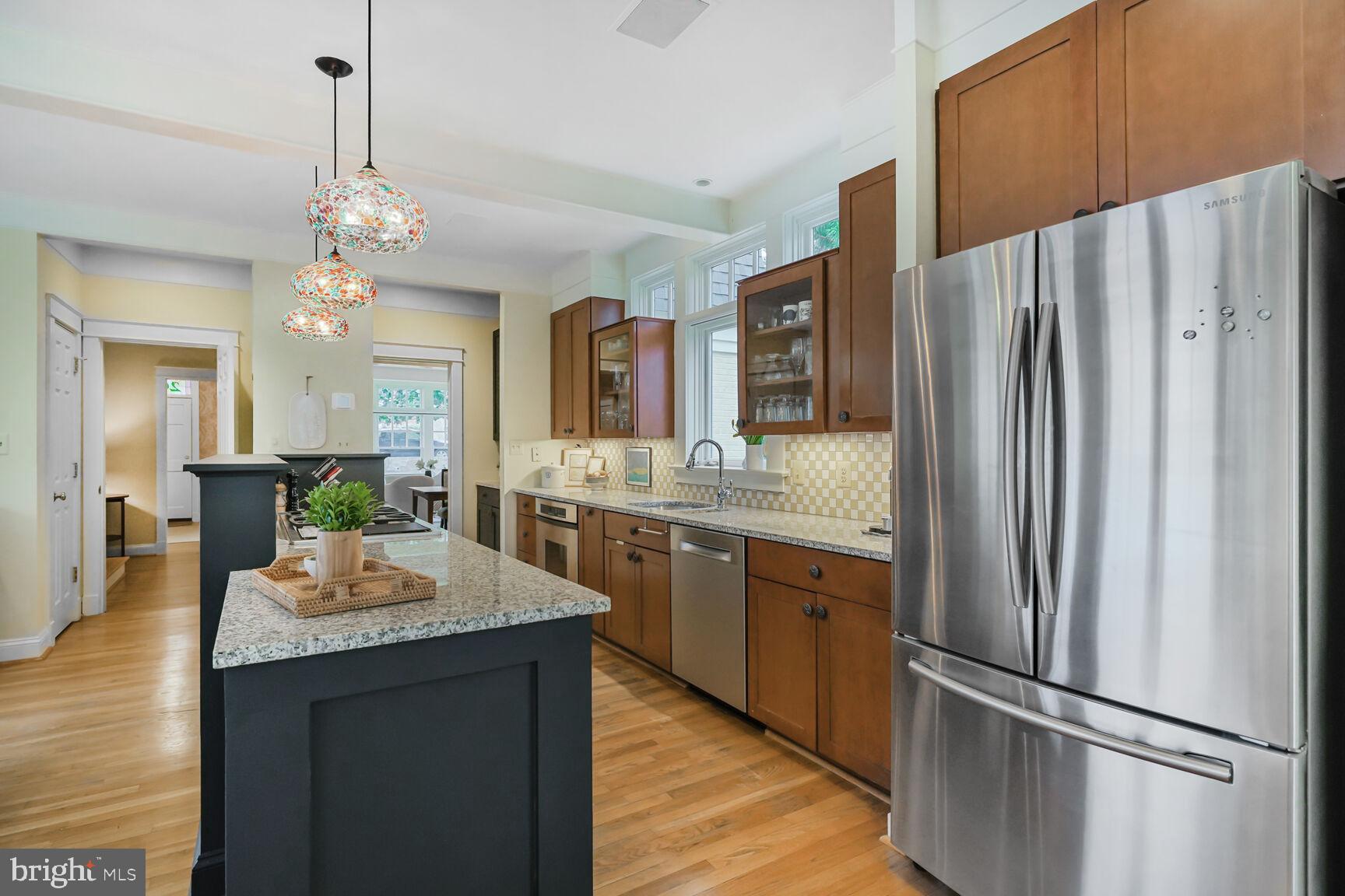 2012 Rockingham Street McLean, VA 22101 - Photo 8 of 45 a kitchen with stainless steel appliances granite countertop a refrigerator and a sink