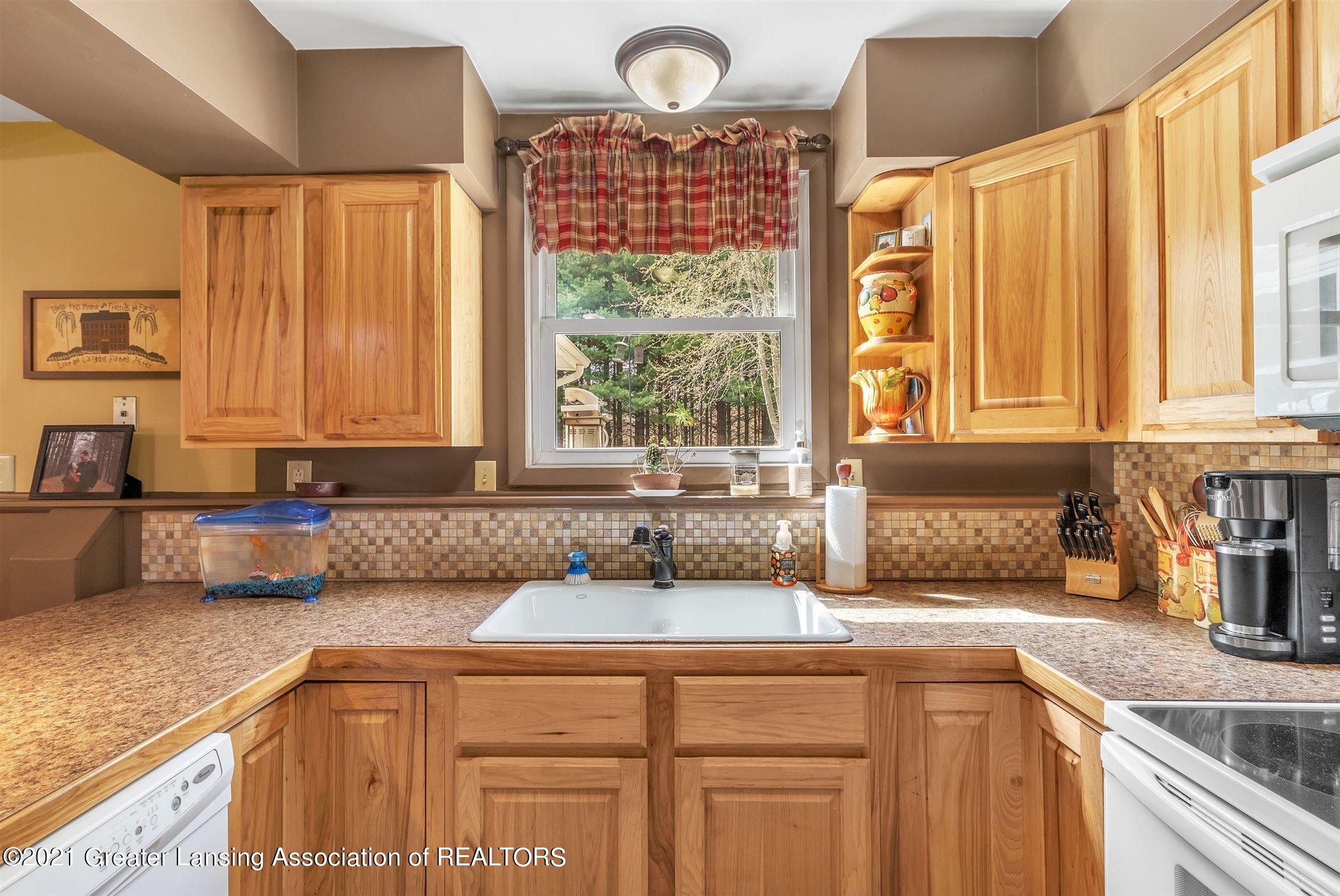 935 North Onondaga Road Holt, MI 48842 - Photo 15 of 51 15-935-N-Onodaga-Rd-WindowStill-Real-Est