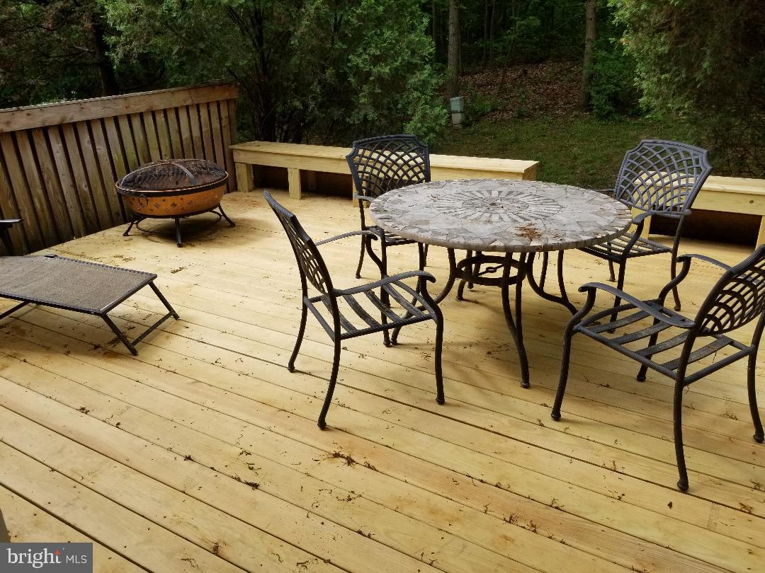 1603 Oak Spring Way Reston, VA 20190 - Photo 7 of 22 Brand new Large deck off of main level.