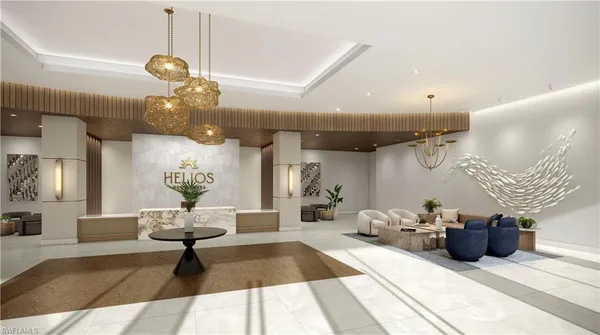 a living room with lots of furniture and view of chandelier