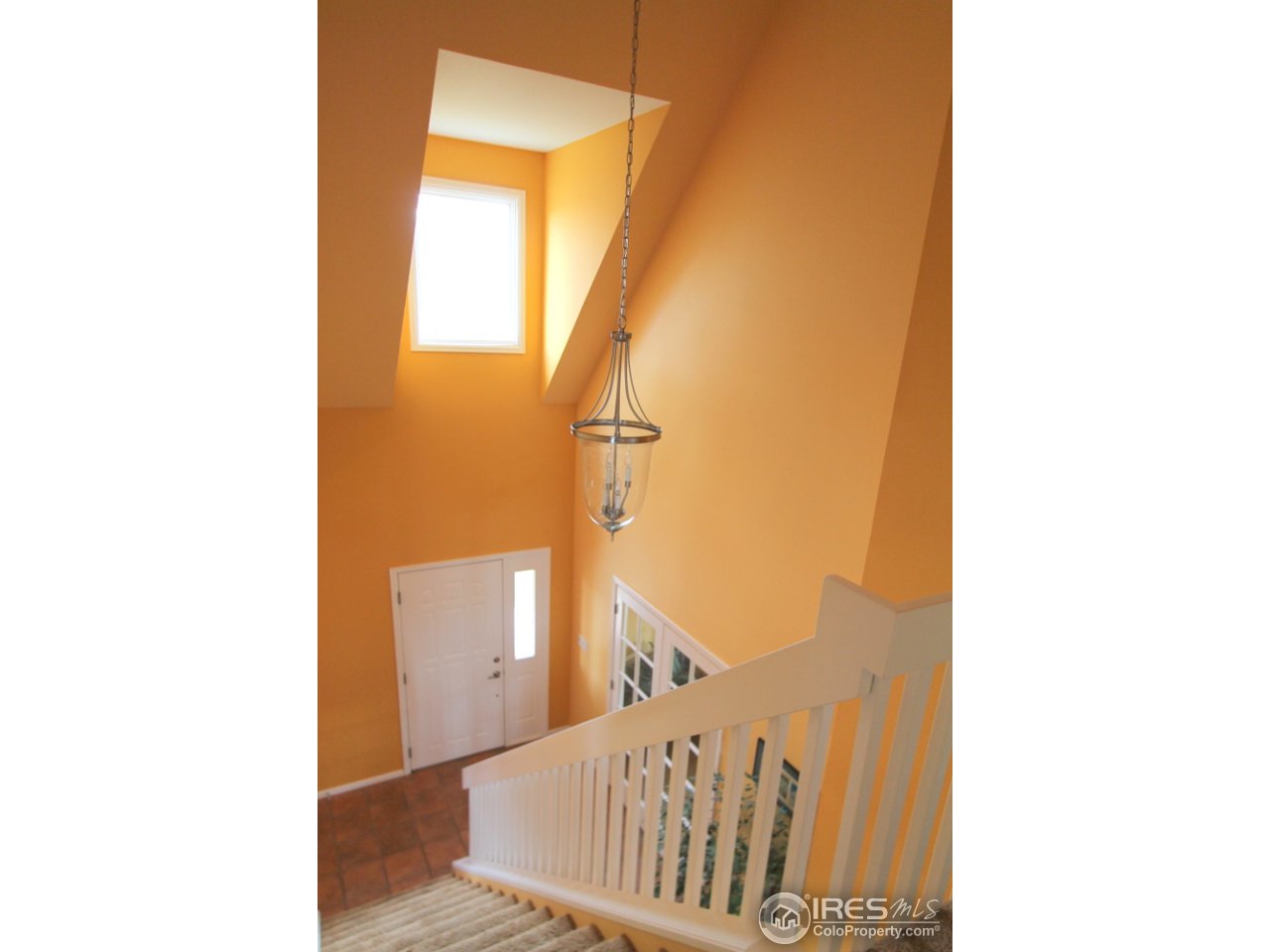 411 High Court Fort Collins, CO 80521 - Photo 2 of 25 a view of a staircase