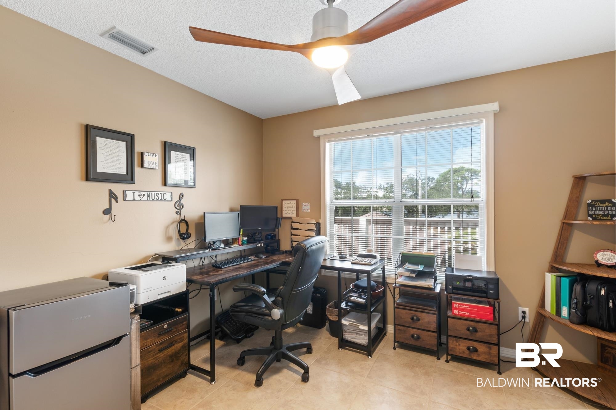 328 Windmill Ridge Road Gulf Shores, AL 36542 - Photo 15 of 47 Office with ceiling fan, light tile patterned floors, and a textured ceiling