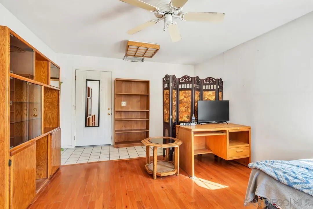 9326 Oakbourne Road Santee, CA 92071 - Photo 23 of 41 a view of a livingroom with furniture and wooden floor