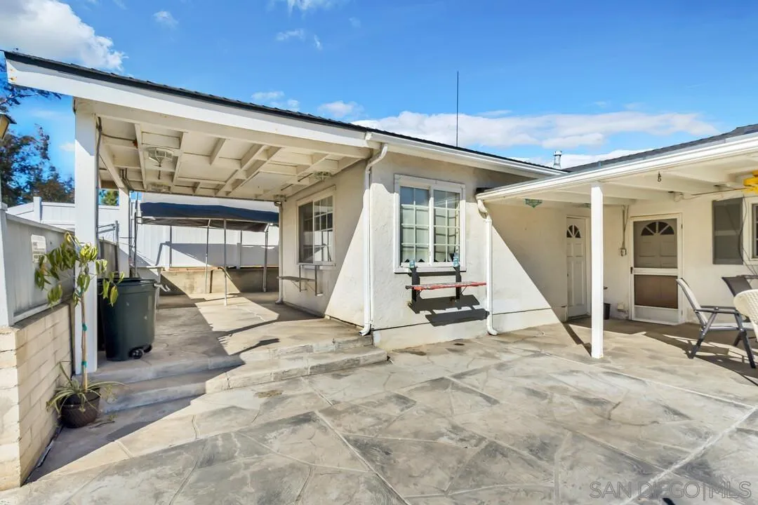 9326 Oakbourne Road Santee, CA 92071 - Photo 32 of 41 a view of a hall with floor to ceiling windows
