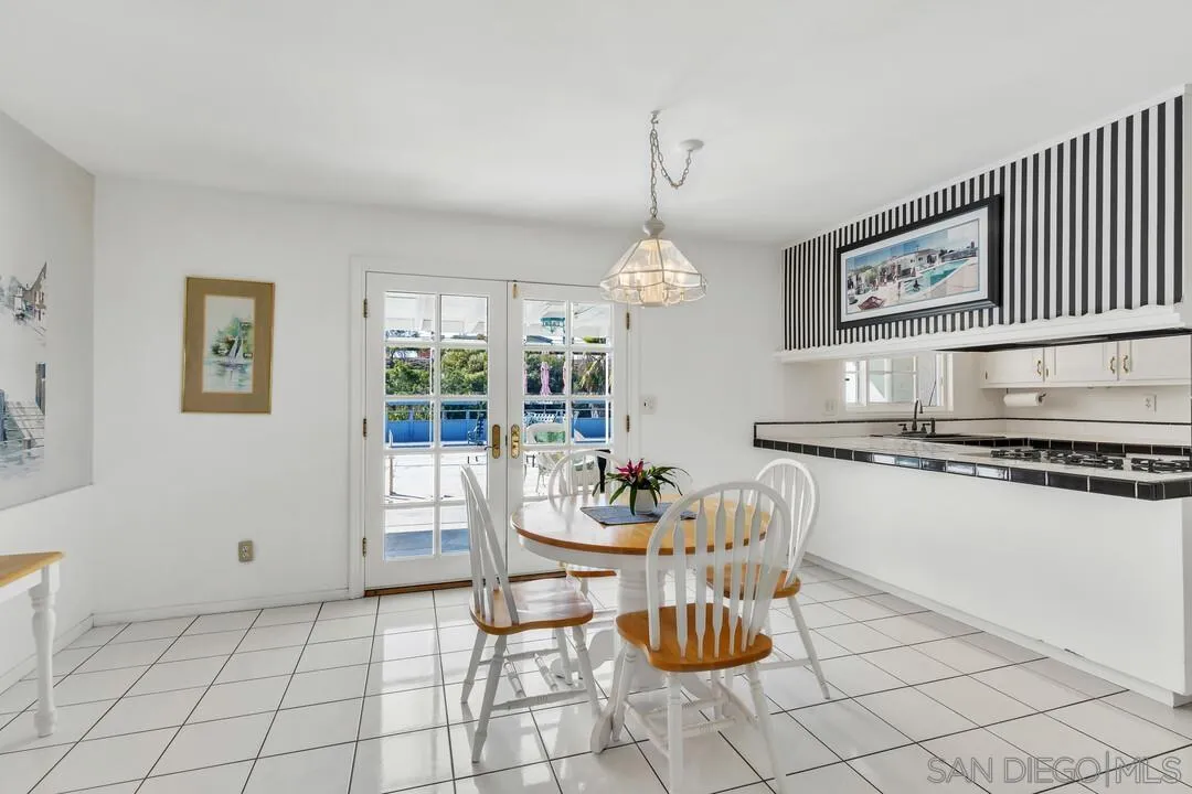 9326 Oakbourne Road Santee, CA 92071 - Photo 5 of 41 a dining room with furniture and chandelier