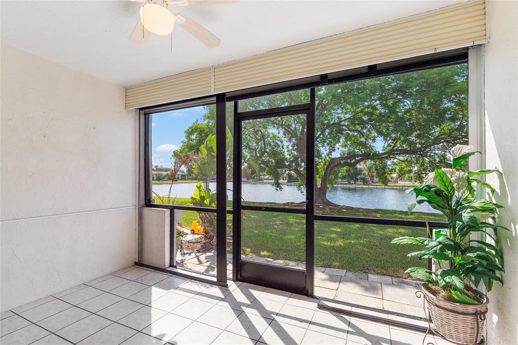 9676 West McNab Road, Unit 110 Fort Lauderdale, FL 33321 - Photo 18 of 26 a view of a porch with a garden