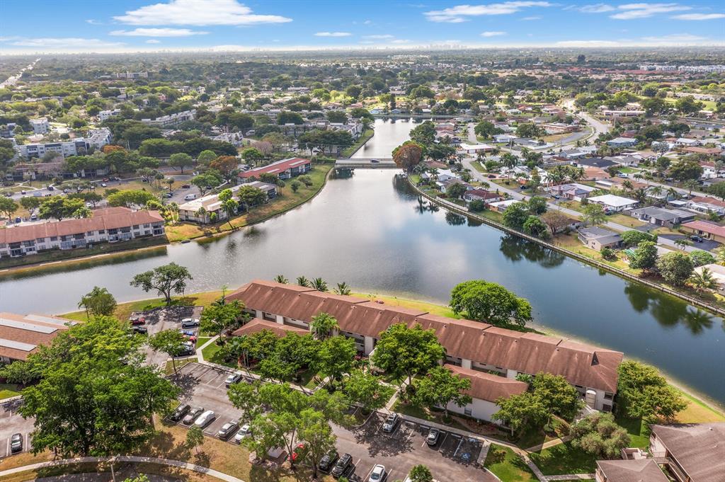 9676 West McNab Road, Unit 110 Fort Lauderdale, FL 33321 - Photo 23 of 26 an aerial view of a city with lake view