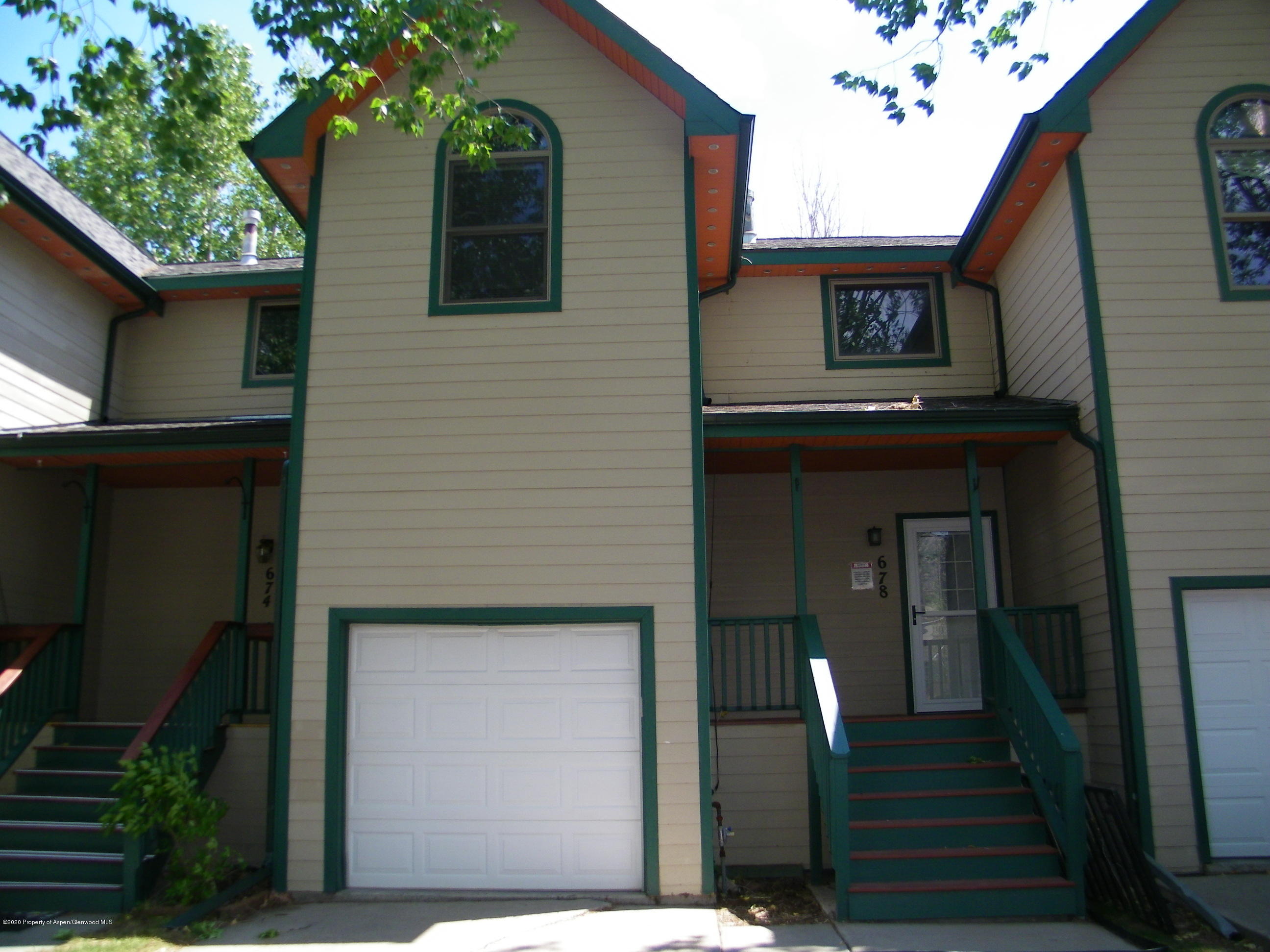 678 Alder Ridge Lane New Castle, CO 81647 - Photo 1 of 18 a front view of a house with a garden