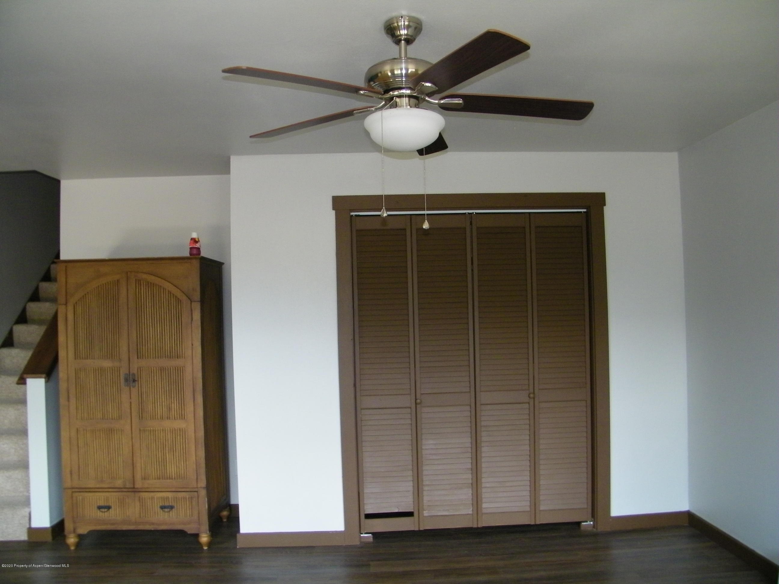 678 Alder Ridge Lane New Castle, CO 81647 - Photo 9 of 18 a view of entryway and hall with wooden floor