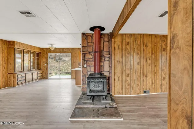 a view of a hallway with windows