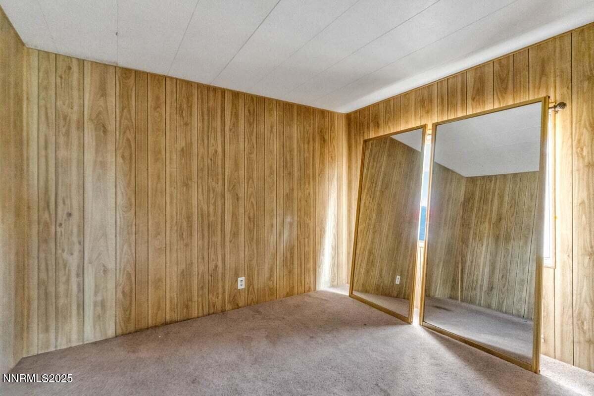 1211 Slate Road Topaz Ranch Estates, NV 89444 - Photo 25 of 30 a view of entryway with wooden walls