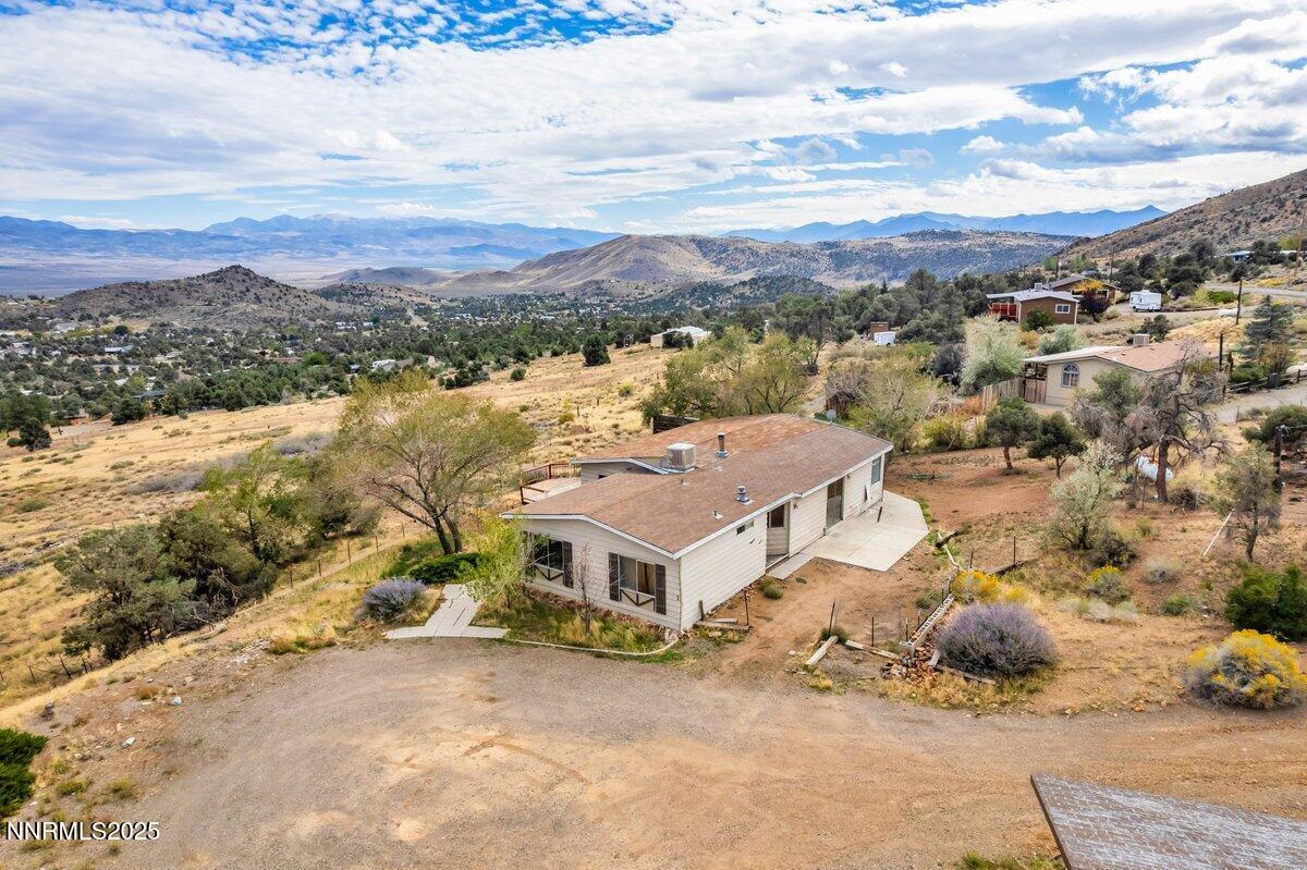 1211 Slate Road Topaz Ranch Estates, NV 89444 - Photo 8 of 30 an aerial view of a house with a mountain