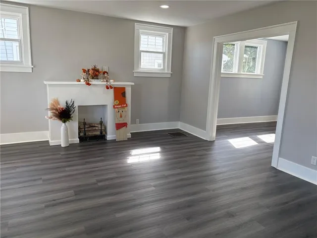 a view of a livingroom with wooden floor
