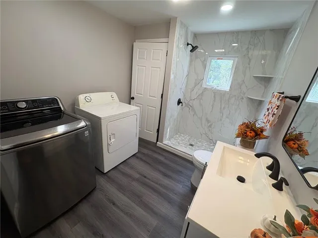 a bathroom with a sink and mirror