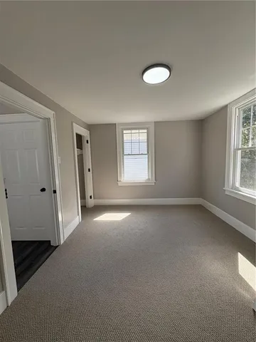 an empty room that has a window