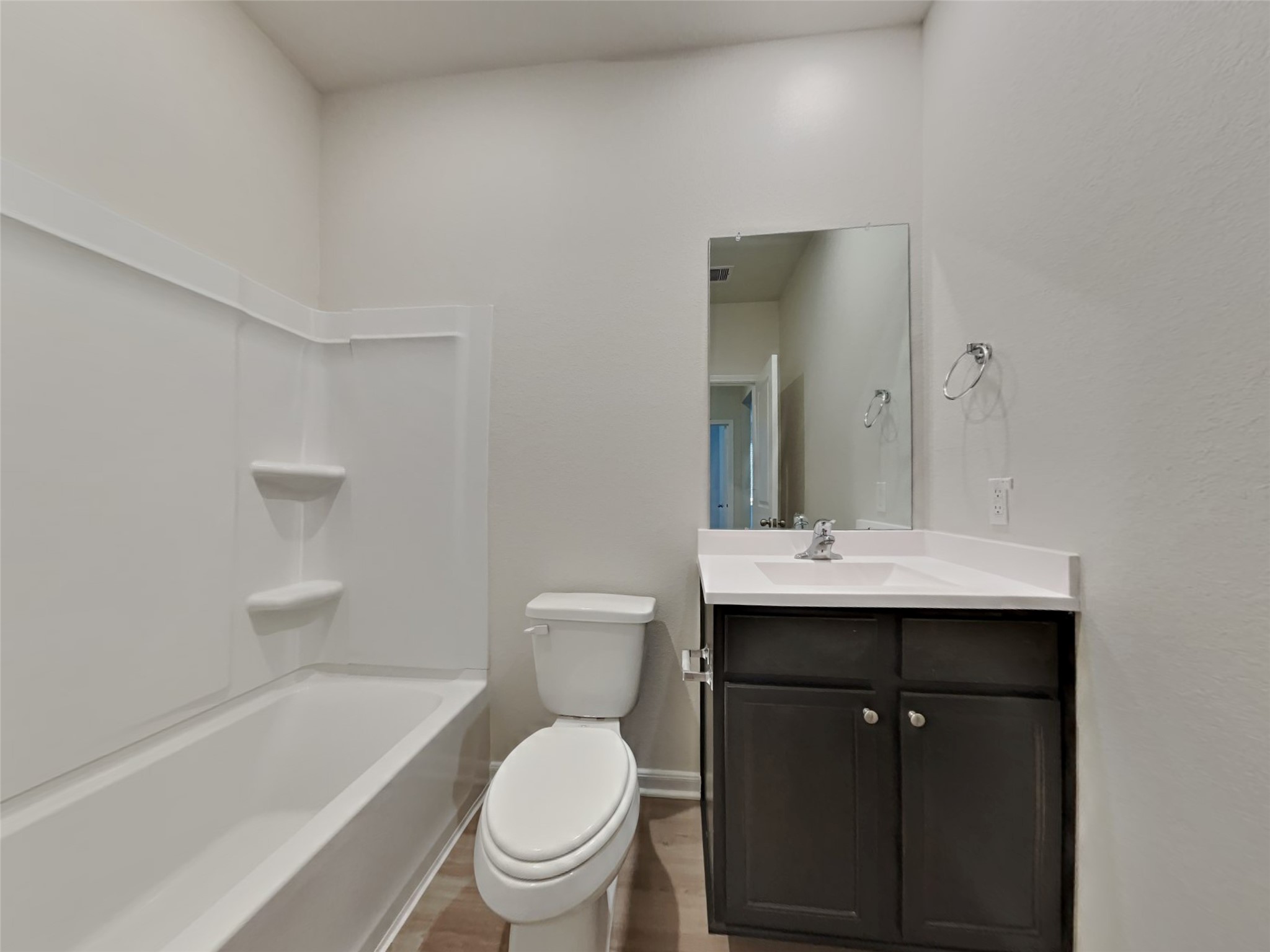 15419 Maple Ter Drive Conroe, TX 77303 - Photo 24 of 26 a bathroom with a sink toilet and shower