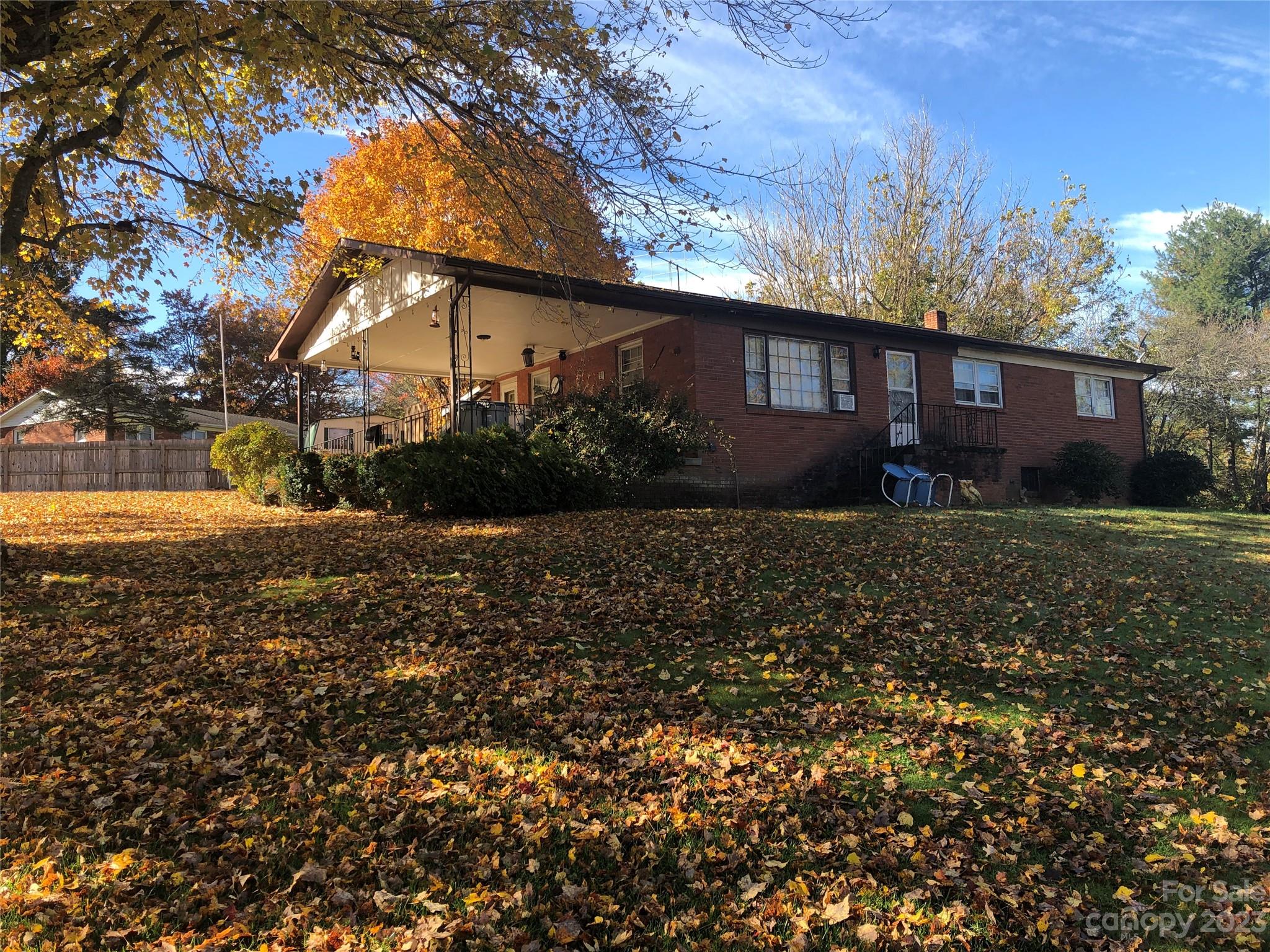 530 Shelton Road Clyde, NC 28721 - Photo 2 of 36 a view of house with yard