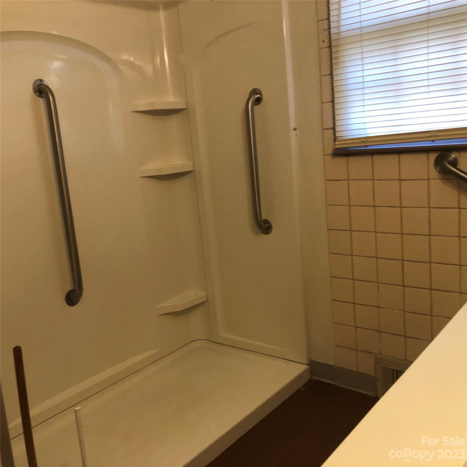 530 Shelton Road Clyde, NC 28721 - Photo 25 of 36 a bathroom with a shower