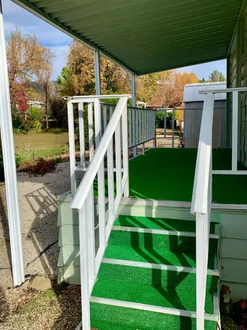 a view of backyard with green space