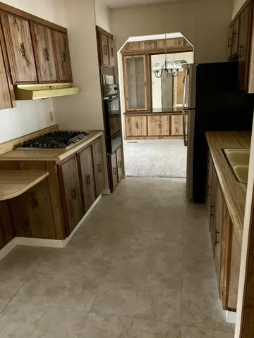 a view of a utility room with a sink
