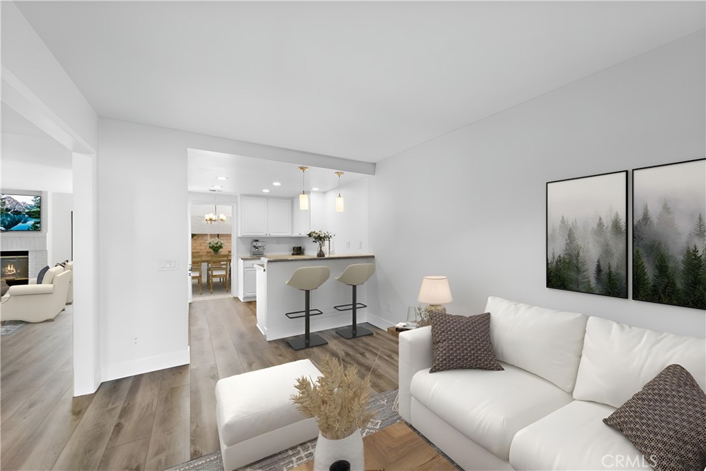 25702 Seaside Drive Dana Point, CA 92629 - Photo 12 of 37 a living room with furniture and a table