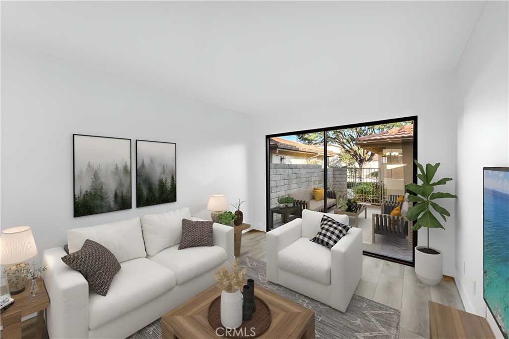 25702 Seaside Drive Dana Point, CA 92629 - Photo 14 of 37 a living room with furniture and a large window