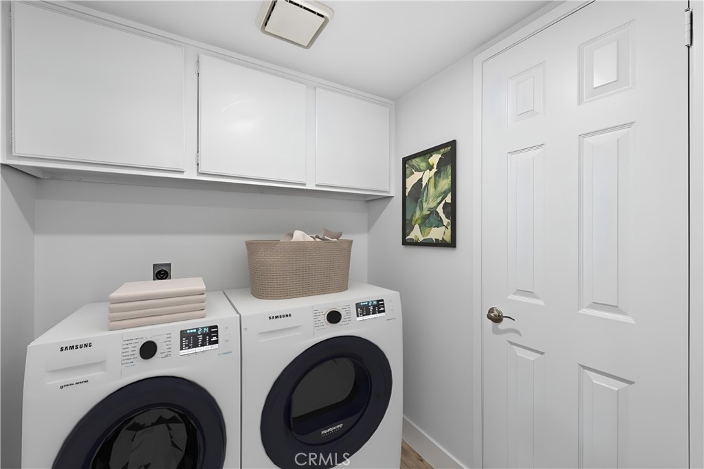 25702 Seaside Drive Dana Point, CA 92629 - Photo 19 of 37 a utility room with dryer and washer