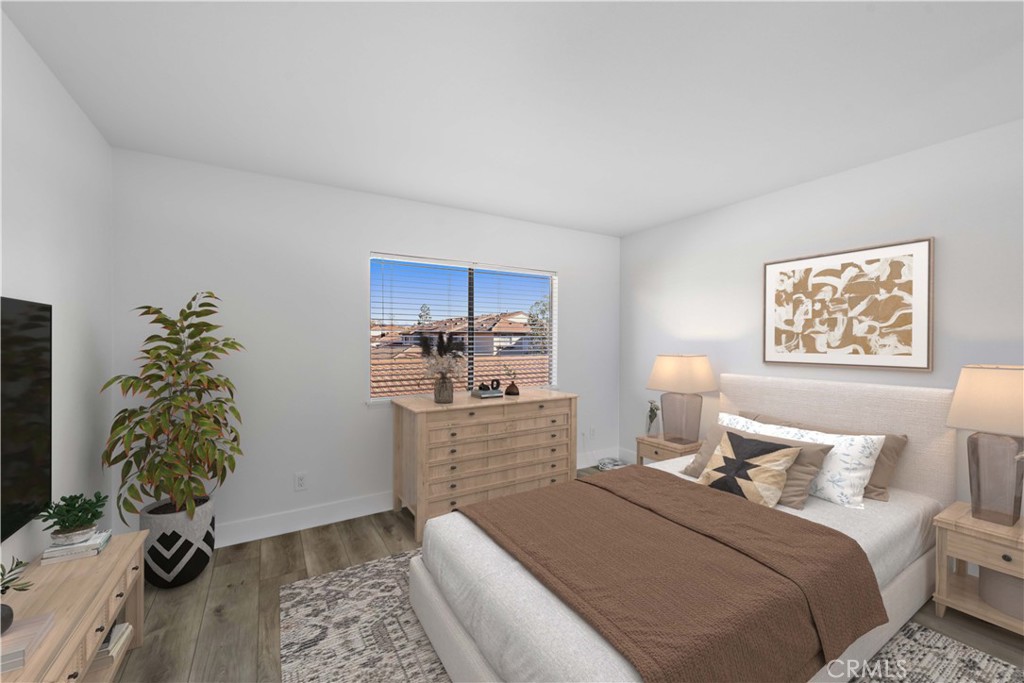 25702 Seaside Drive Dana Point, CA 92629 - Photo 20 of 37 a room with a bed and a window