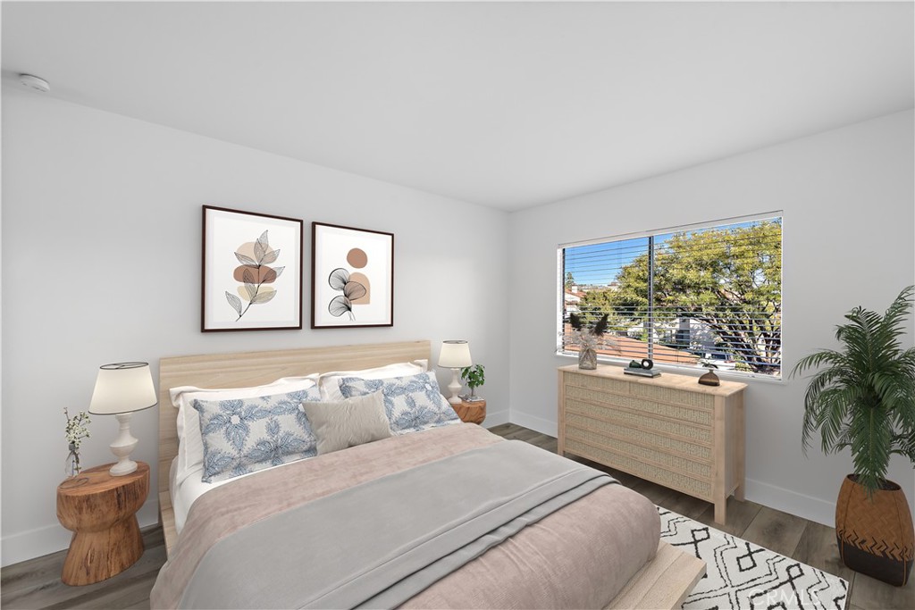 25702 Seaside Drive Dana Point, CA 92629 - Photo 21 of 37 a bedroom with a bed and a window