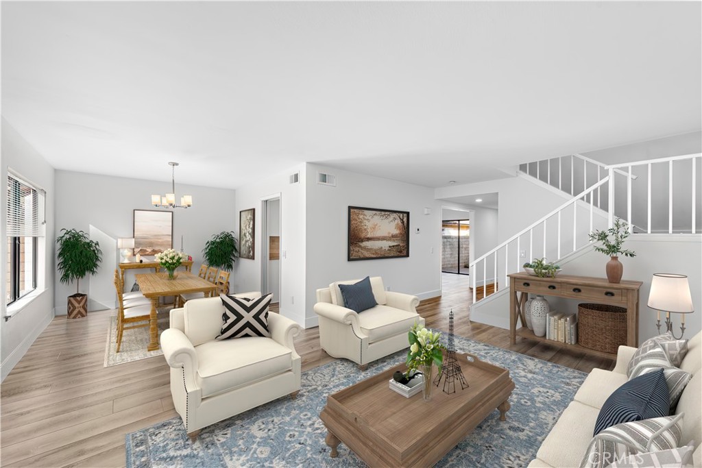 25702 Seaside Drive Dana Point, CA 92629 - Photo 8 of 37 a living room with furniture and a fireplace