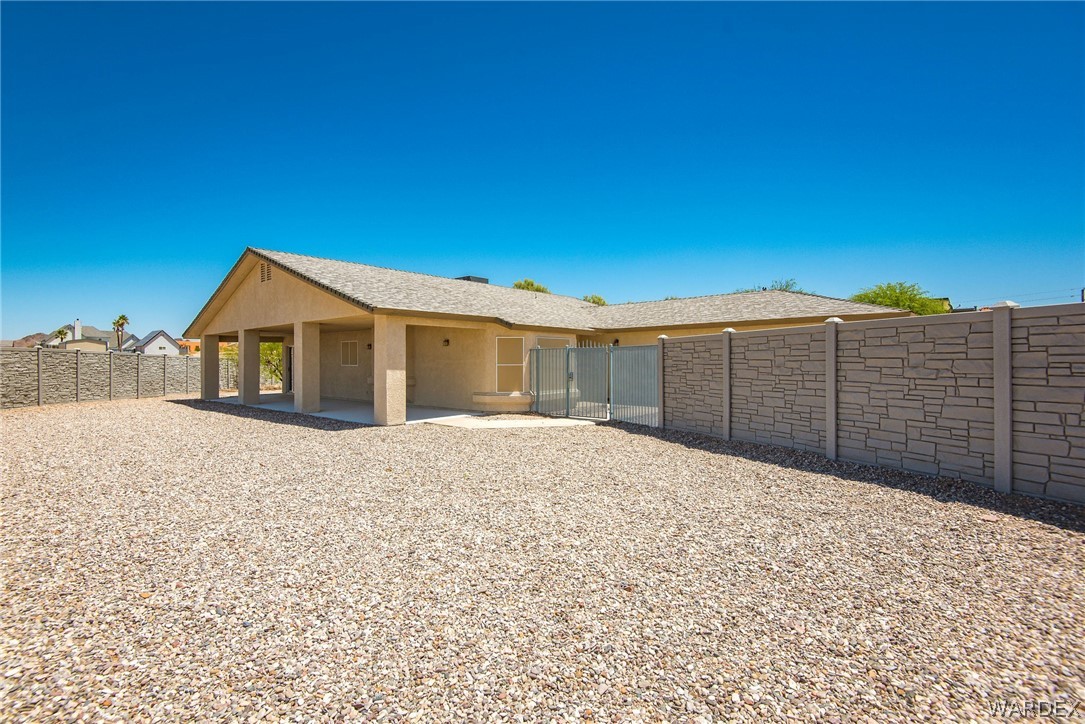 3395 Pegasus Ranch Lane Bullhead City, AZ 86429 - Photo 12 of 50 a view of backyard of house