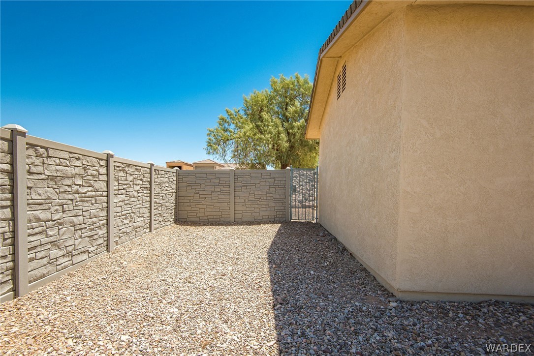 3395 Pegasus Ranch Lane Bullhead City, AZ 86429 - Photo 17 of 50 a view of wooden wall and building