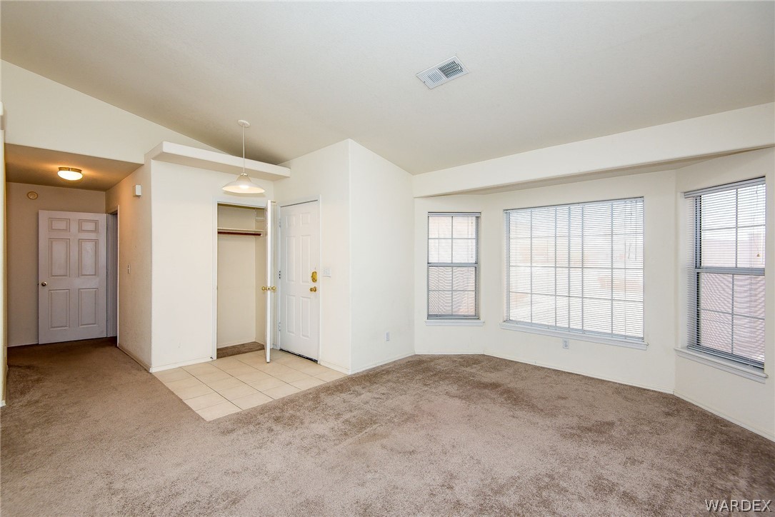 3395 Pegasus Ranch Lane Bullhead City, AZ 86429 - Photo 18 of 50 a view of an empty room with a window