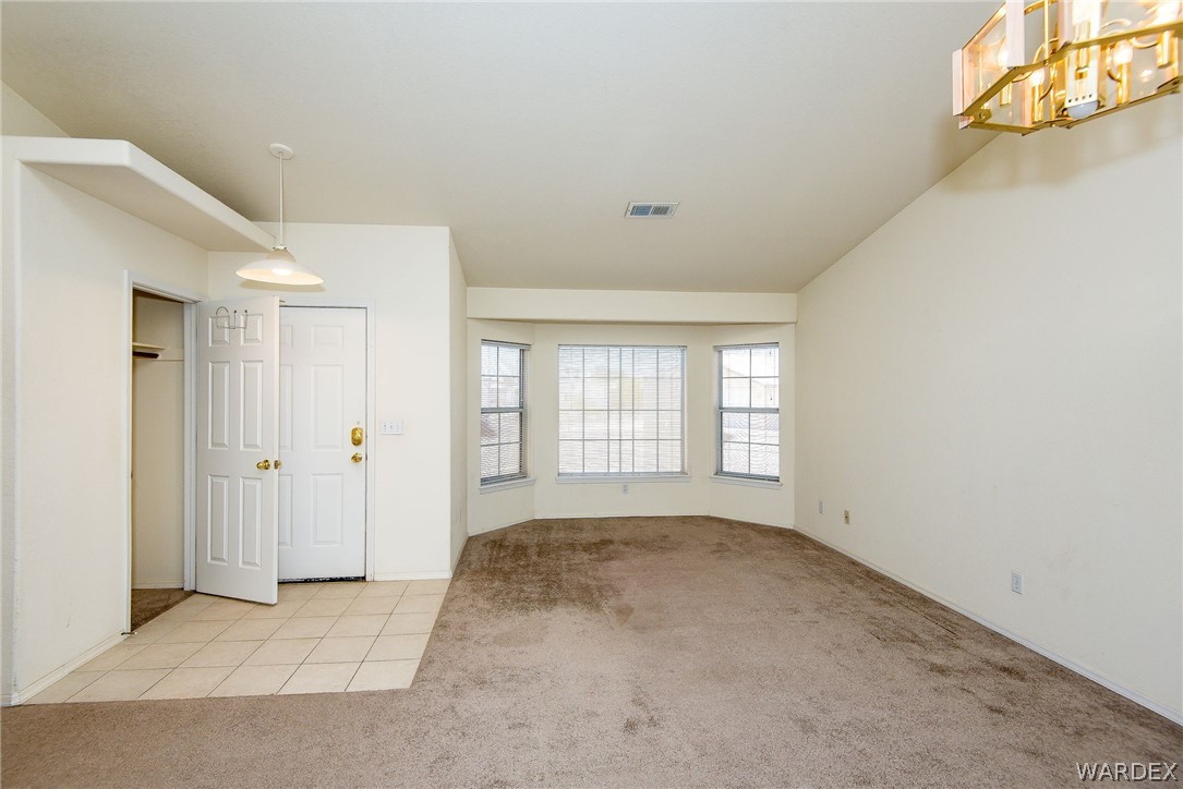 3395 Pegasus Ranch Lane Bullhead City, AZ 86429 - Photo 19 of 50 a view of an empty room with a window