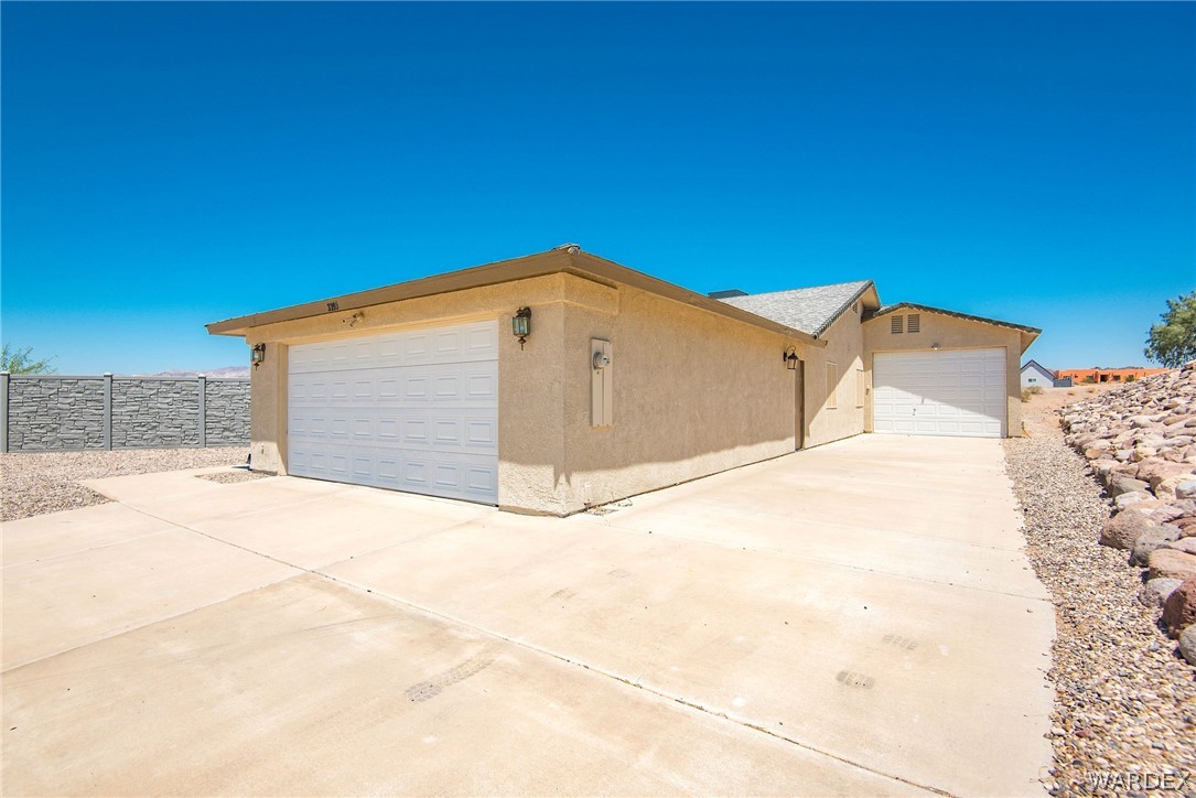 3395 Pegasus Ranch Lane Bullhead City, AZ 86429 - Photo 2 of 50 a view of a garage