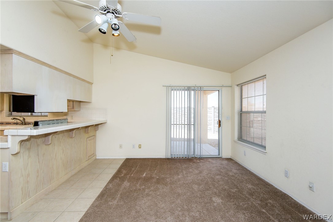 3395 Pegasus Ranch Lane Bullhead City, AZ 86429 - Photo 24 of 50 a view of a kitchen with microwave and windows